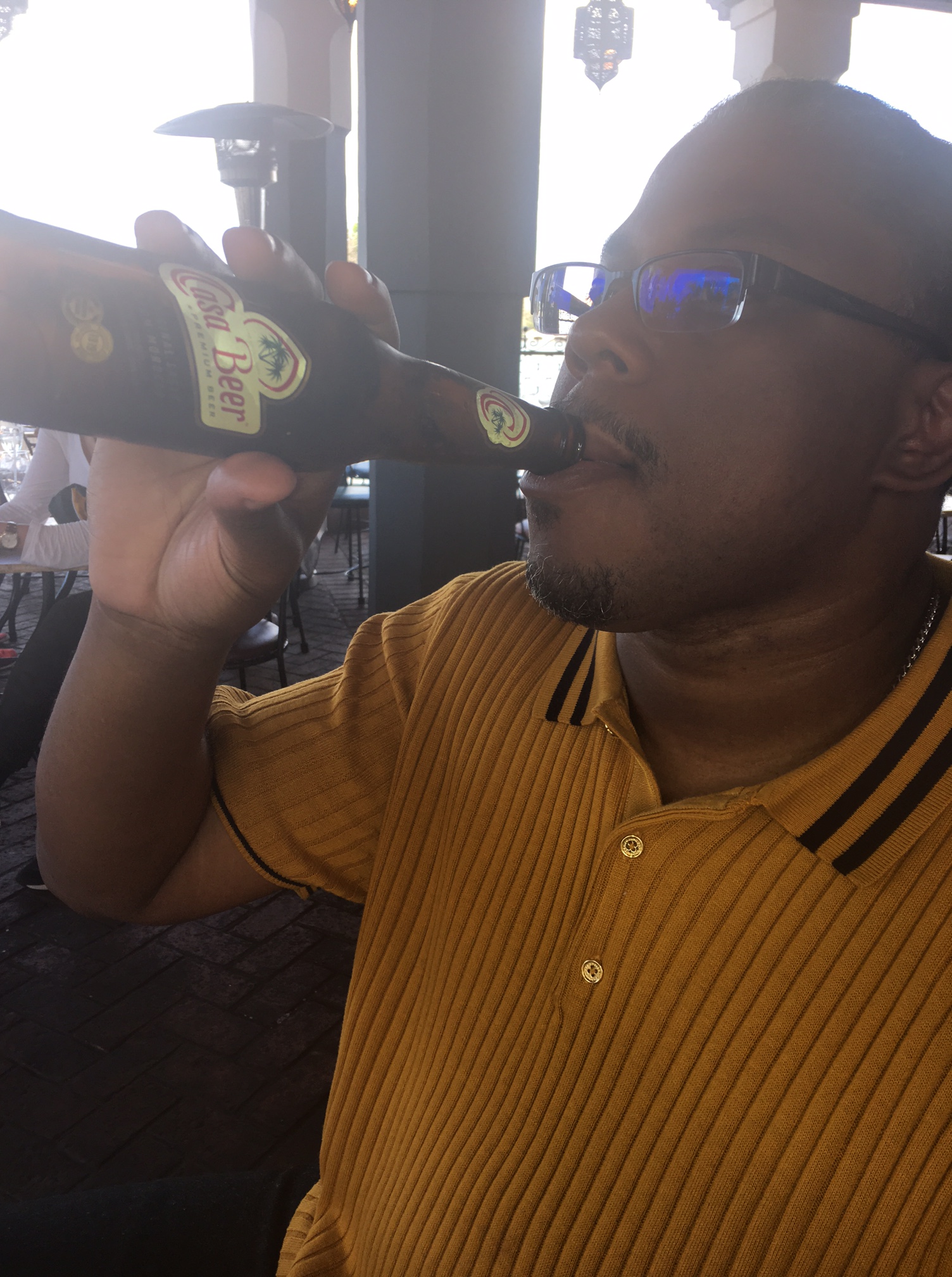 Aquil enjoying Moroccan Beer.JPG